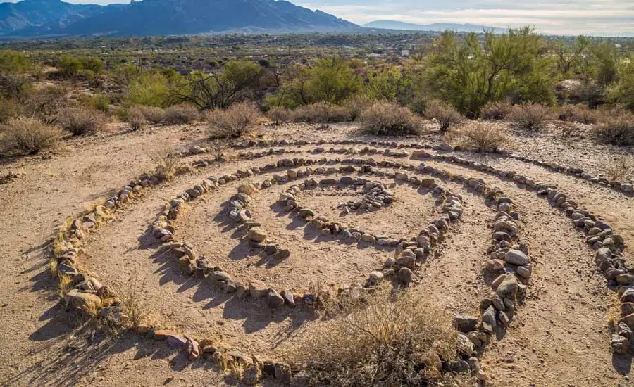 A medicine wheel shaped with rocks shows the concept of effective Native American drug and alcohol treatment centers in New Mexico