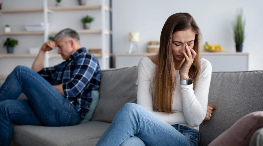 Image of two people with blurred boundaries representing emotional enmeshment and loss of individuality in an unhealthy relationship